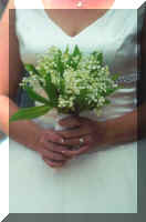 girl with flowers closeup.JPG (16307 bytes)